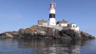 Maidens Lighthouse Northern Ireland in the Irish Sea 