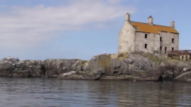 Maidens Lighthouse Northern Ireland in the Irish Sea 