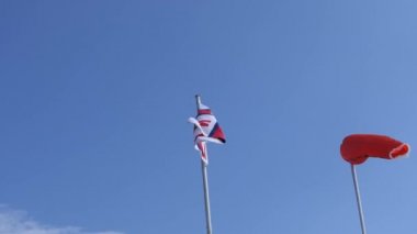 RNLI Flag on Portrush Beach North Coast Co Antrim Northern Ireland 