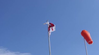 RNLI Flag on Portrush Beach North Coast Co Antrim Northern Ireland 