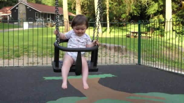 Small Girl Having Fun Swing Playpark — Stock video