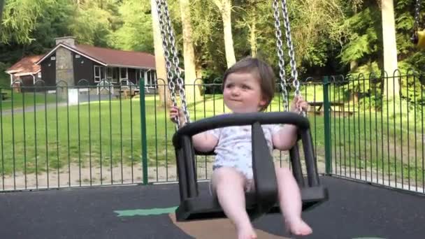 Small Girl Having Fun Swing Playpark — Video Stock