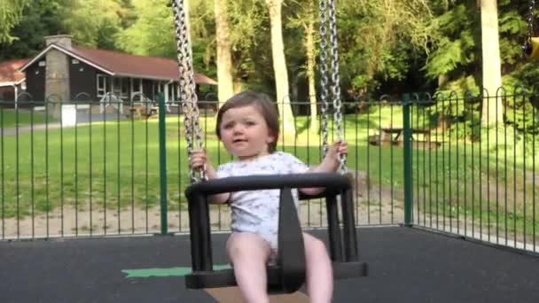 Small Girl Having Fun Swing Playpark — Stock video