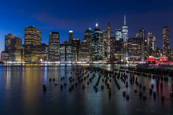 Ciudad Nueva York Skyline Por Noche Imagen de archivo