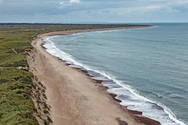 View from the limestone rock Bjulberg to the landscape at the North Sea coast in Jutland, Denmark