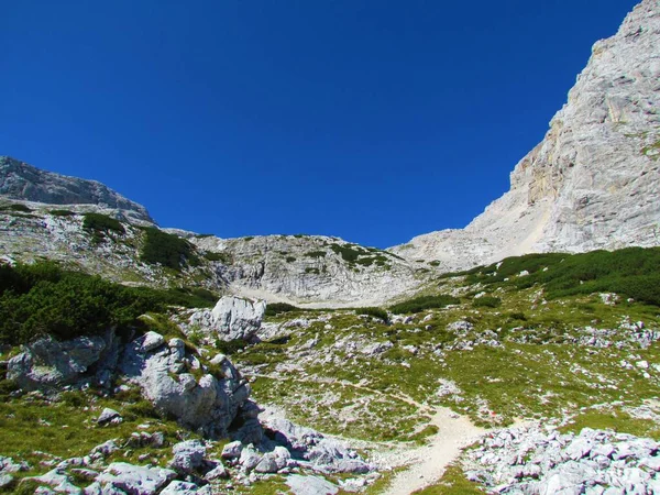 High alpine landscape bellow mountain Skrlatica in Triglav national park and Julian alps in Gorenjska region of SloveniaHigh alpine landscape bellow mountain Skrlatica in Triglav national park and Julian alps in Gorenjska region of Slovenia