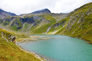 View of Nassfeld-Speicher reservoir at Grossglockner High Alpine Road in High Tauern, Carinthia, Austria