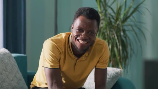 Cheerful black guy celebrating success — Stock Video