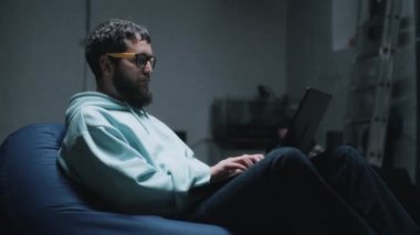 Programmer working in a bomb shelter