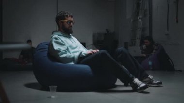 Web developers working in a bomb shelter