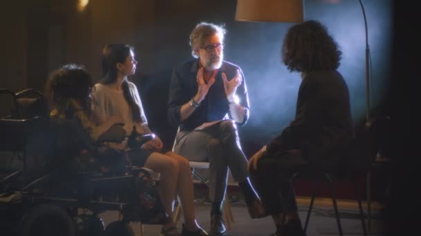 Group Actors Disabled Actress Director Script Sitting Dark Stage Discussing — Video