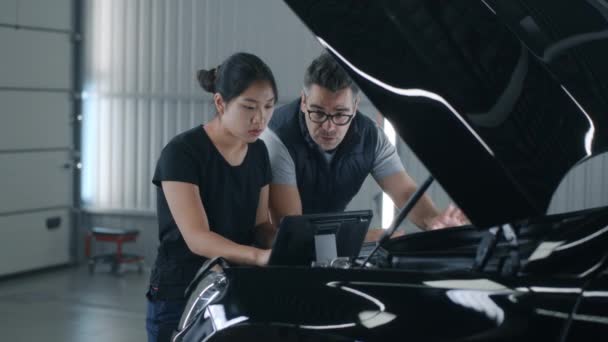 Man Woman Service Manager Repair Shop Hood Diagnosing Checking Car — Video