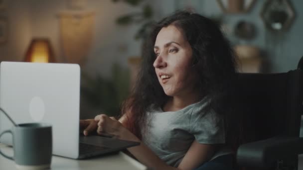 Woman Disability Sitting Wheelchair Table Living Room Browsing Internet Social — Video