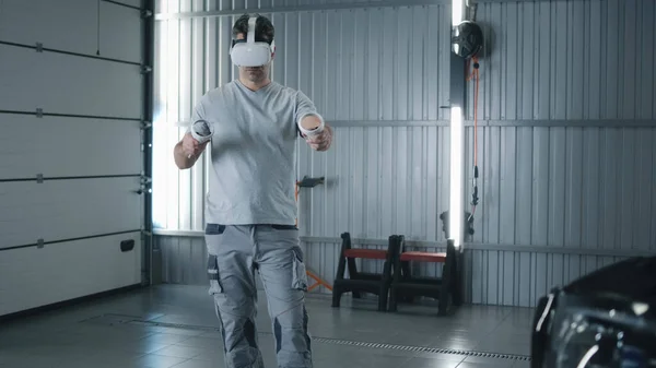 Man Worker Uniform Modern Virtual Reality Glasses Controllers Checking Testing — Zdjęcie stockowe