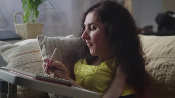 Woman Disability Smiling While Drawing Digital Tablet Computer Stylus Sitting — 图库视频影像