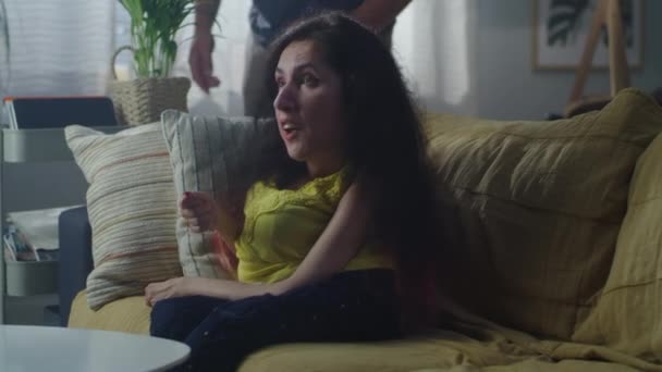 Irritated Husband Talking Yelling Wife Physical Disability Who Sitting Sofa — Stockvideo