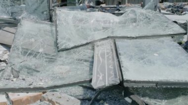 ZAPORIZHIA, UKRAINE - JULY 19, 2022: damaged glass covering from the roof of the mall during the war and Russian aggression in Ukraine
