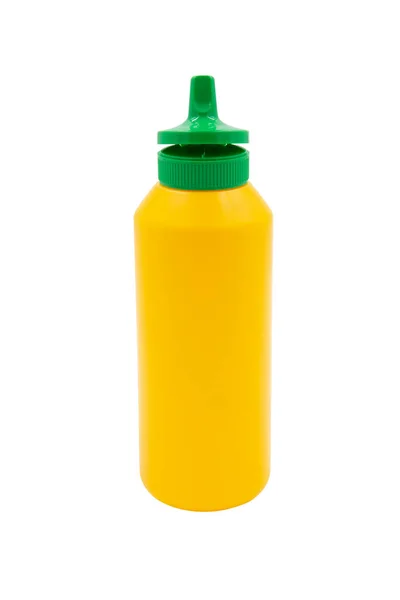 白色底座上分离的芥末用黄色挤塑瓶 — 图库照片