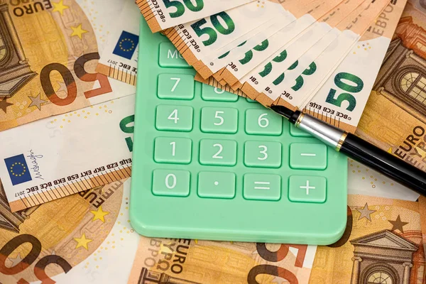 business and exchange concept with euro cash and calculator. economy