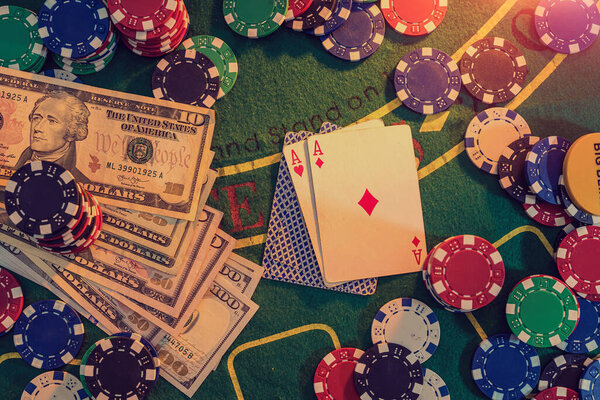 Poker combination with chips playing cards and win dollars in casino table. gambling