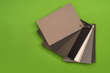 Yeşil arkaplanda izole edilmiş mobilya dokusu ve deseni için vinil örnekleyici