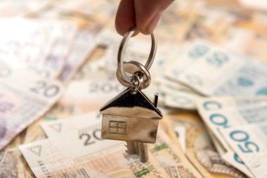 Ev için anahtar, cilalama parasıyla, pln. Emlak kavramı