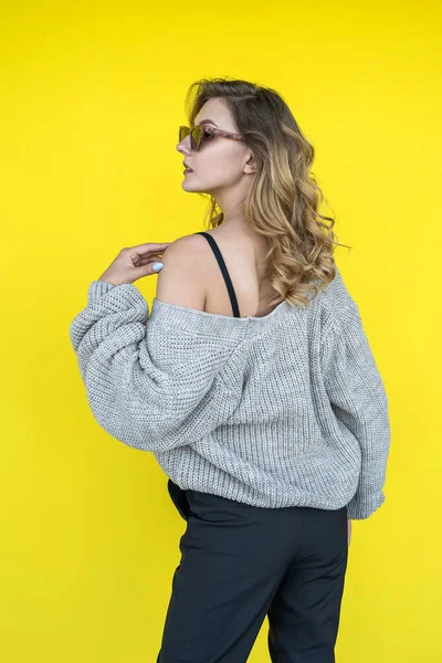 Positive Female Model Posing Gray Knitted Sweater Sunglasses Yellow Wall — Stock Photo, Image
