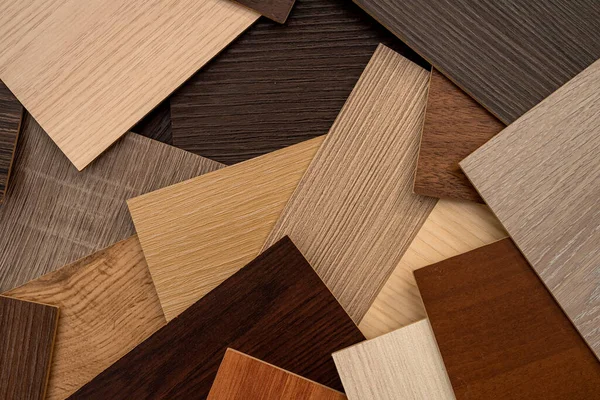 Variety of wooden like tiles. Samples of fake wood tiles for