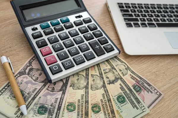 Wooden Table Laptop Calculator Dollar Bills Pencil Business Concept — Stockfoto