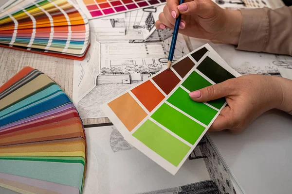 Female Hand Selects Color Palette Architectural Plan Renovation Concept — Foto Stock