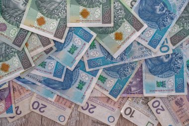 Farklı Polonya parasından yapılmış arka plan 10 20 50 pln zloti banknot, finans konsepti