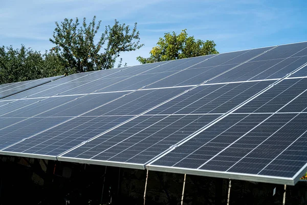 Sun energy with solar panels close up. View on the blue sky