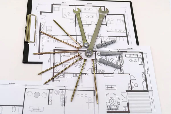 house blueprints with work tools drawing instruments on the worktable. projects of apartament