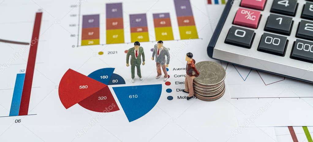 Small business people standing on paper business and financial analysis report graph. teamwork concept
