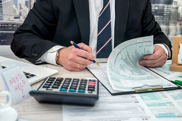 Businessman Making Calculation Financial Annual Report Fill 1040 Tax Form — ストック写真