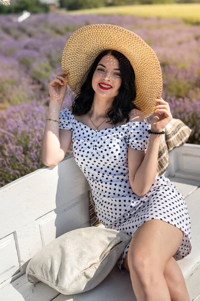 Young Brunette Straw Hat Sits Background Lavender White Polka Dot — Stock fotografie