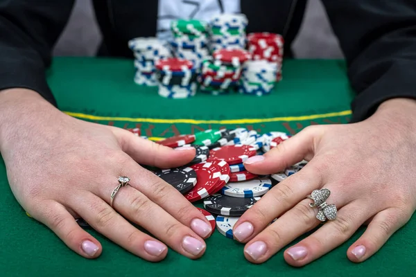 woman raising bets in poker game, lucky. Play in casino for best winner