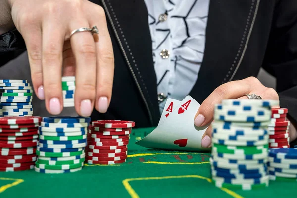 young woman bets in the casino having a winning combination. gambling