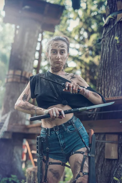 Portrait Young Girl Torn Clothes Holding Knife Machete Posing Woods — Fotografia de Stock
