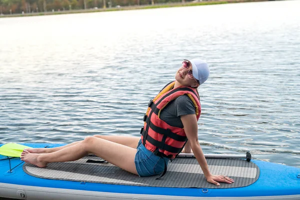 Young Woman Wear Life Vest Rest Paddle Board First Training — Photo
