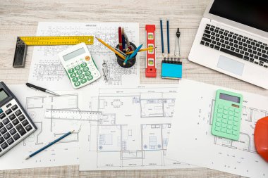 beautiful sketches of drawings for new houses scattered on the table. Design concept