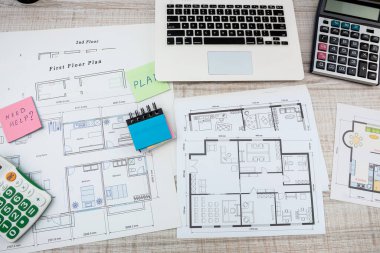 designers work as a team on drawings and designs of new house projects. Design and drawing concept