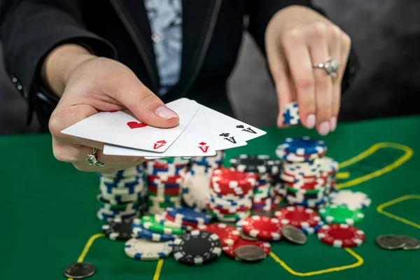 young woman bets in the casino having a winning combination. gambling