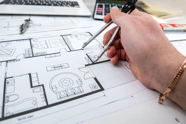 a young designer takes a project where you need to choose colors for a certain drawing of a new house. New building design concept