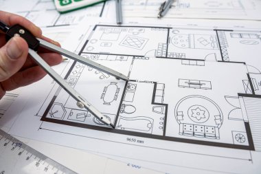 a young designer takes a project where you need to choose colors for a certain drawing of a new house. New building design concept