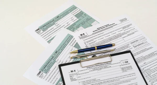 Tax forms for the current year for US citizens to file a return. Documents to fill out