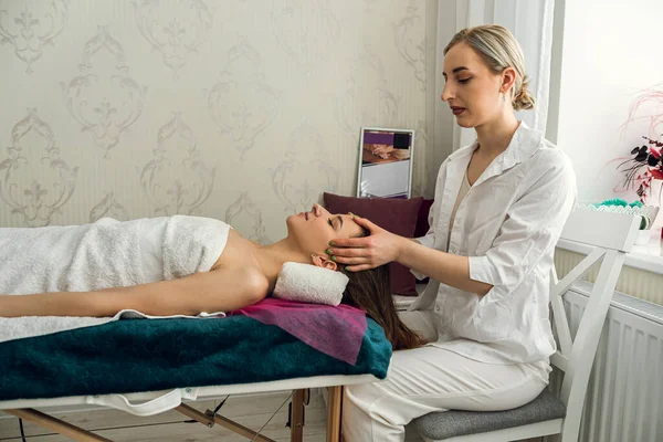 Female Beautician Doing Facial Massage Her Female Client Beauty Clinic — Stock Photo, Image