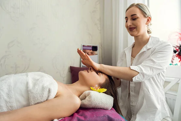 Perfect relax spa face massage for woman in beauty clinic, healthy lifestyle
