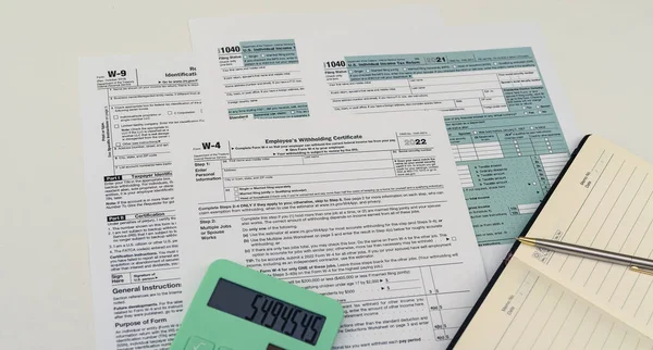 Tax forms for the current year for US citizens to file a return. Documents to fill out