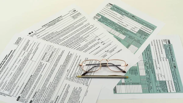 Tax forms for the current year for US citizens to file a return. Documents to fill out